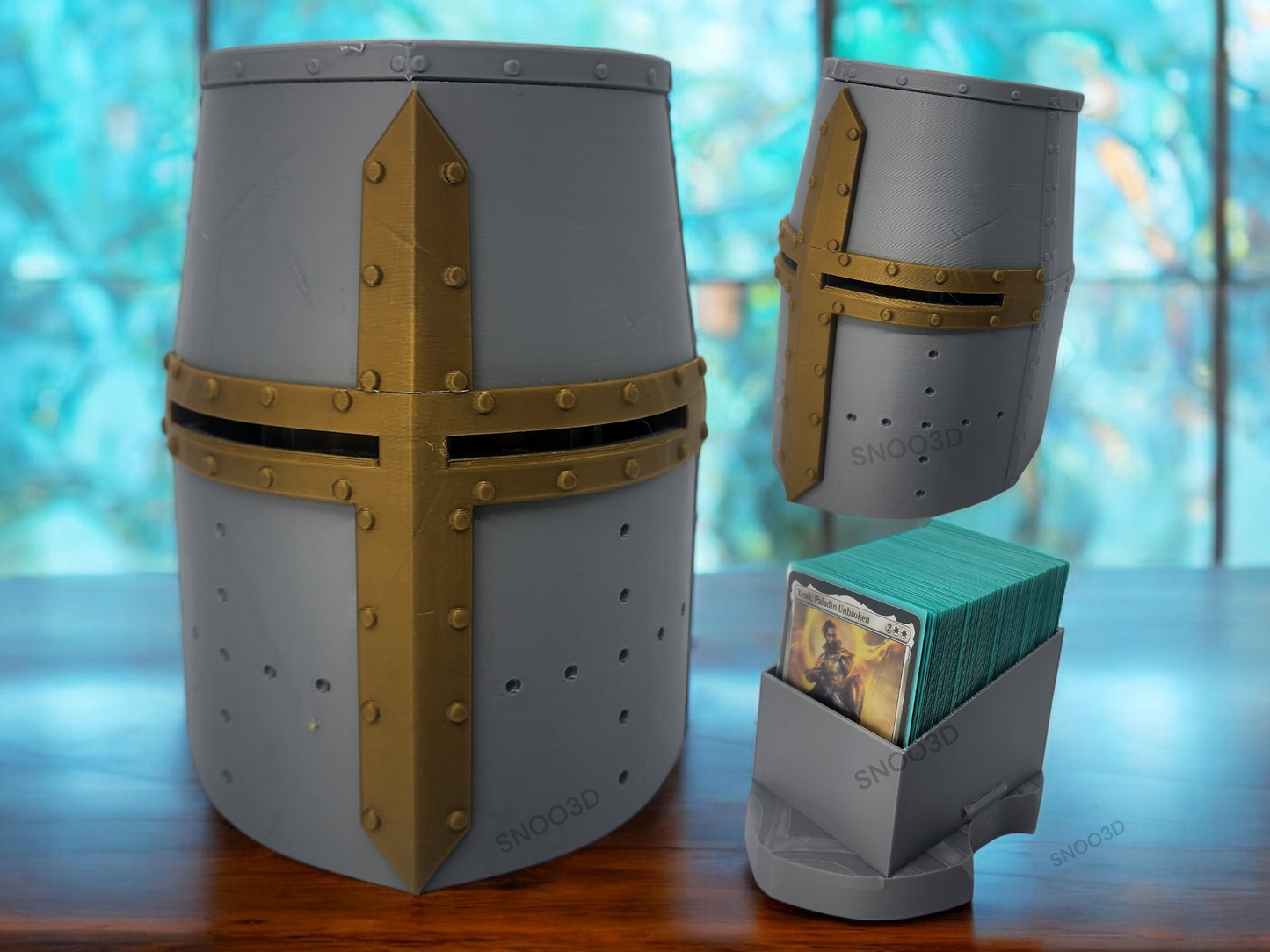 Medieval knight helmet deck box shown with sleeved card storage.