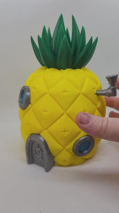 Pineapple house trading card deck box for sleeved TCG cards, angled product view.
